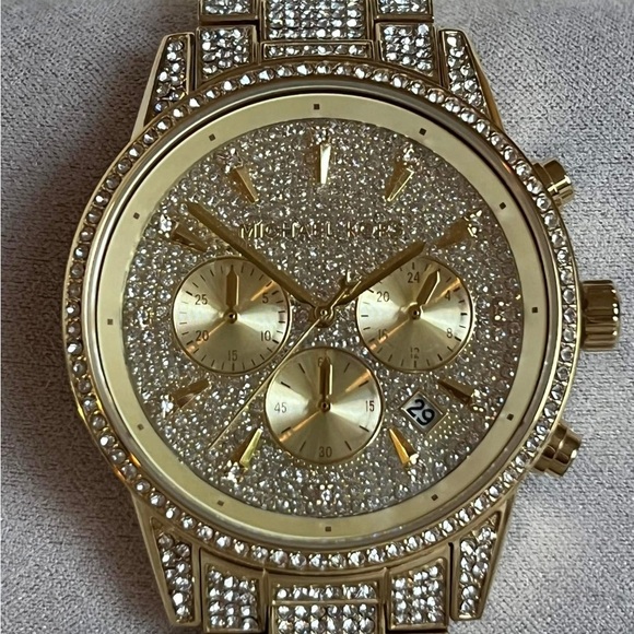Michael Kors Women’s Ritz Pave Gold-Tone Watch
Case Size: 37mm
MSRP: $725 - Picture 1 of 11